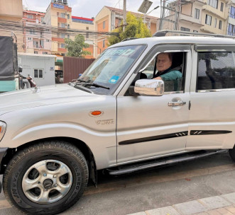 H4CI Director driving the new Mahindra